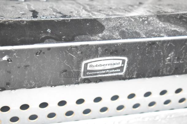 Rubbermaid black metal trash can shell with perforated design, showing "Rubbermaid Commercial Products" label clearly.
