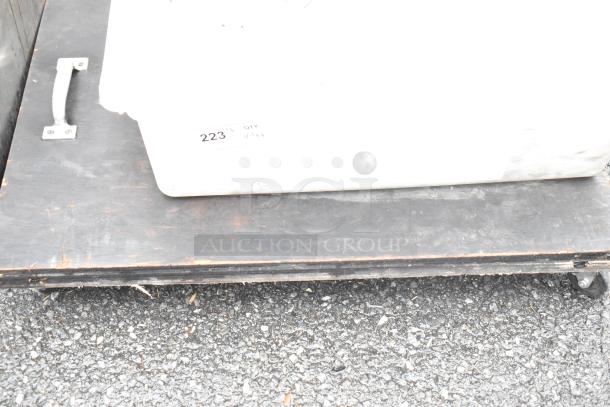 Lot of various items including white ceramic plates and a poly white bin. The bin shows a label with "223" marking.