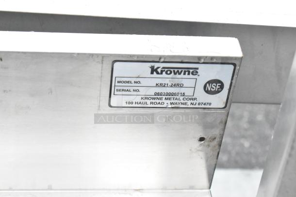 Krowne KR21-24RD stainless steel bottle display rack, NSF certified, good condition with visible model and serial numbers.