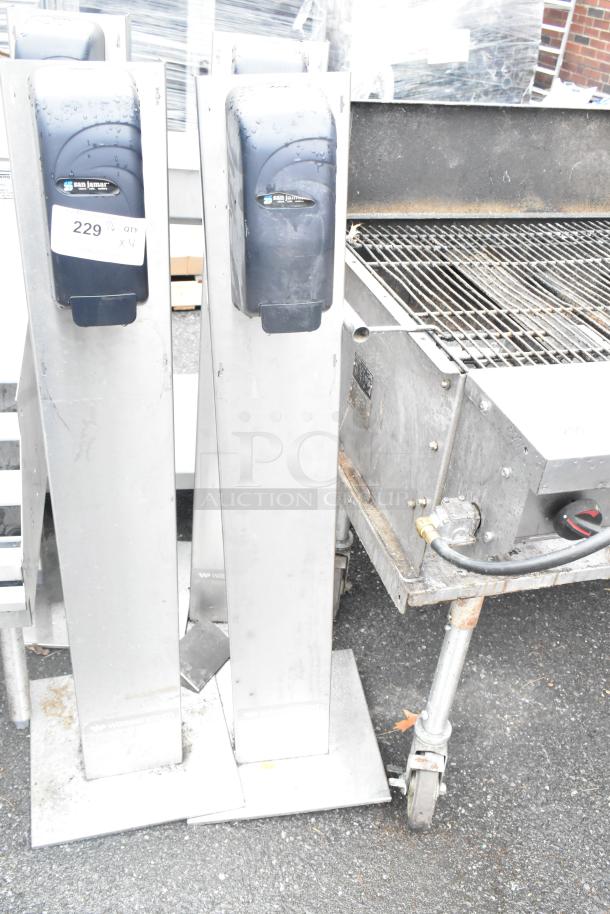 San Jamar poly soap dispensers on metal stands, set of 4, used condition, visible model label, includes auction marking "229 X4".