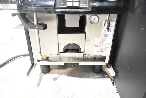 Schaerer SCA1 metal commercial espresso machine, 208-240V, 1 phase, countertop model. Features control panel and pressure gauge.