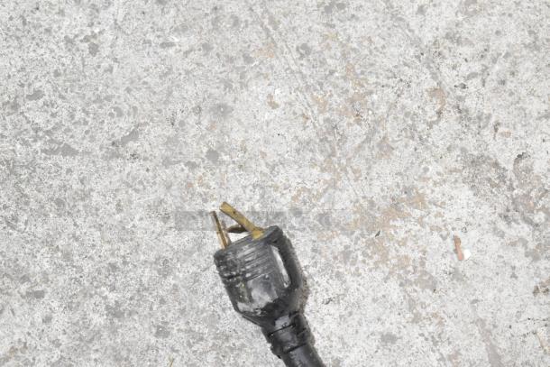 Schaerer SCA1 commercial espresso machine plug, showing wear. For 208-240V, 1 Phase. Metal finish, countertop model.