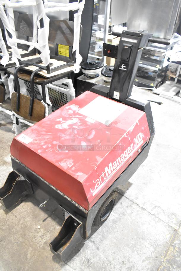 CartManager XD by Gatekeeper Systems, used cart retrieval machine, red surface with signs of wear, dual wheelbase.