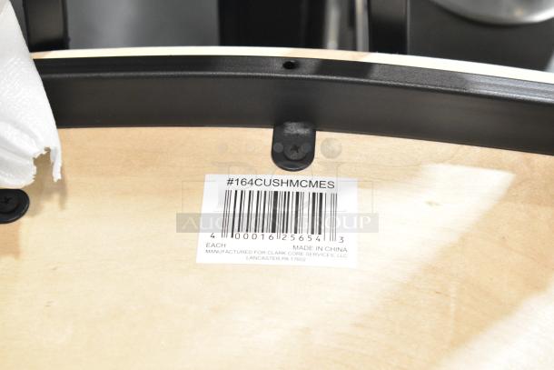 8 brand new black metal bar-height chairs with wooden seats and backrests. Scratch and dent condition. Visible tag: #164CUSHMCMES, made in China for Clark Core Services, LLC.