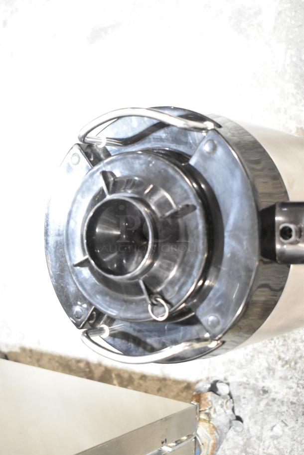 Fetco Stainless Steel Beverage Holder Dispenser, top view, metallic finish, secure lid, excellent condition.