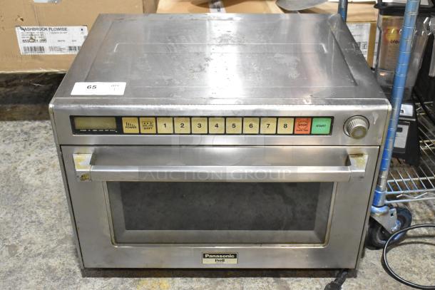 Panasonic NE-2180 stainless steel commercial microwave oven, 208 volts, 1 phase, keypad controls, used condition.