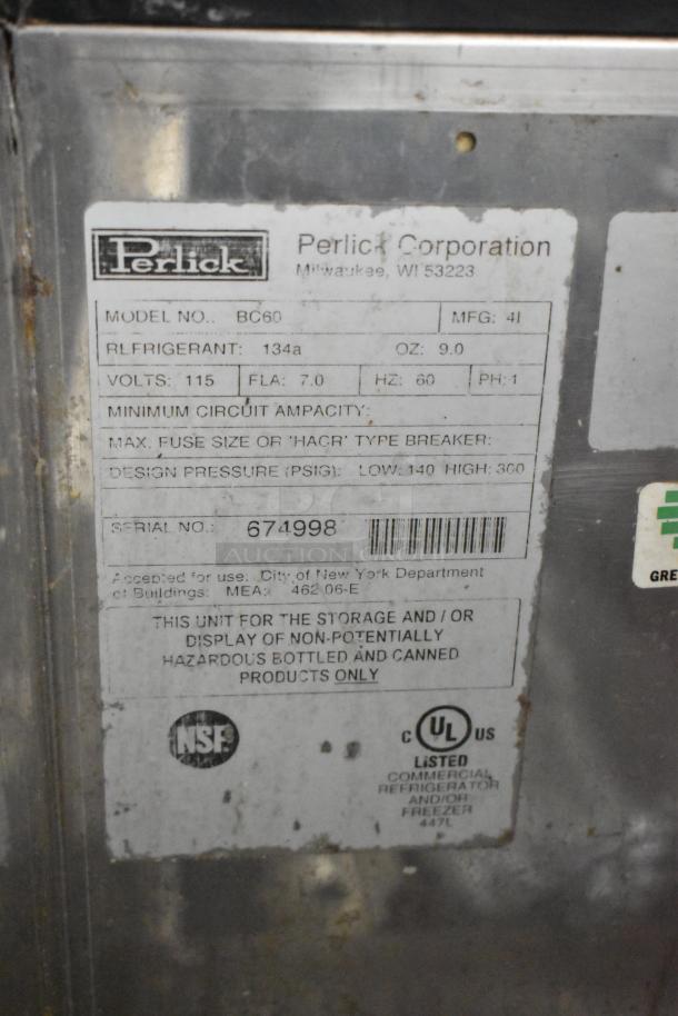 Perlick BC60 back bar bottle cooler. Metal, 115 volts, 1 phase. Features 2 sliding lids. Model info and labels visible.