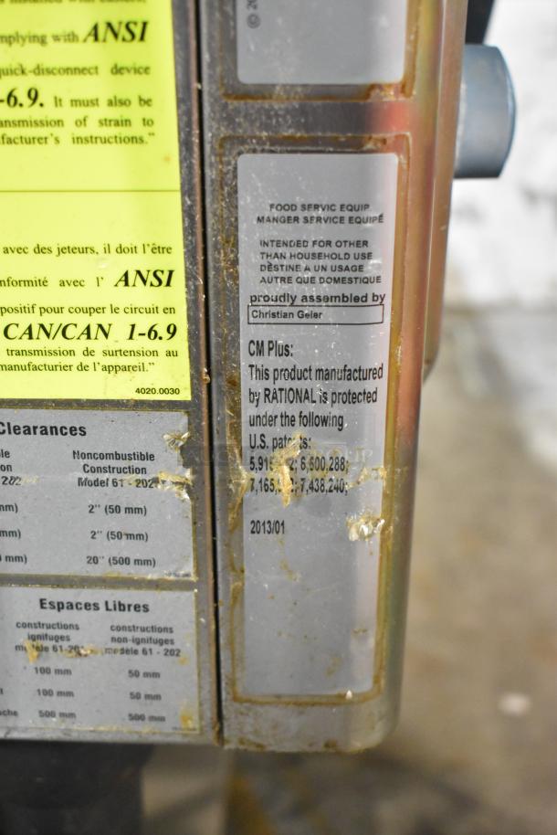 Rational CMP 62G Combi Convection Oven, natural gas, stainless steel, on equipment stand, visible assembly and patent labels.