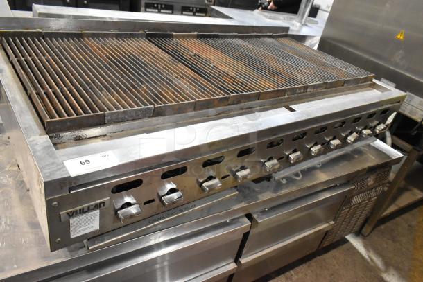 Vulcan stainless steel commercial countertop gas charbroiler grill with multiple burners, visible controls, and Vulcan logo, in used condition.