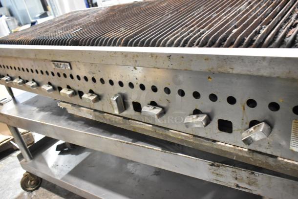 Vulcan stainless steel commercial countertop natural gas charbroiler grill on stand with casters, used condition.