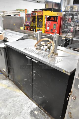 Micro Matic MDD-58 stainless steel kegerator with two beer towers. Features 115 volts, 1 phase. Visible wear on exterior.