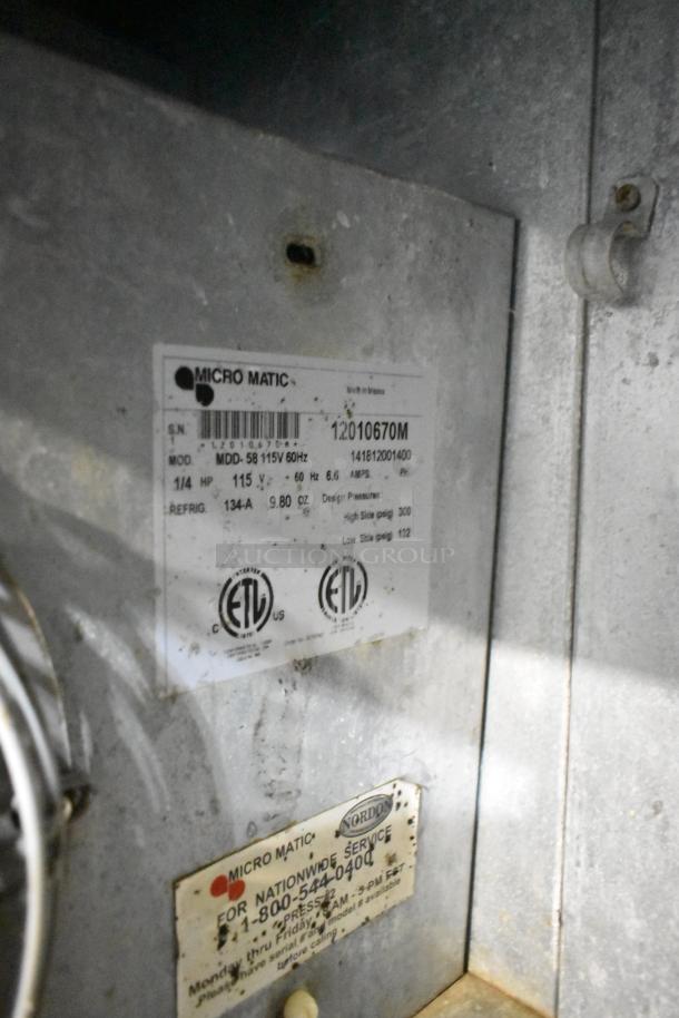 Micro Matic MDD-58 kegerator label showing model details, 115V, ETL certification, and service contact information.