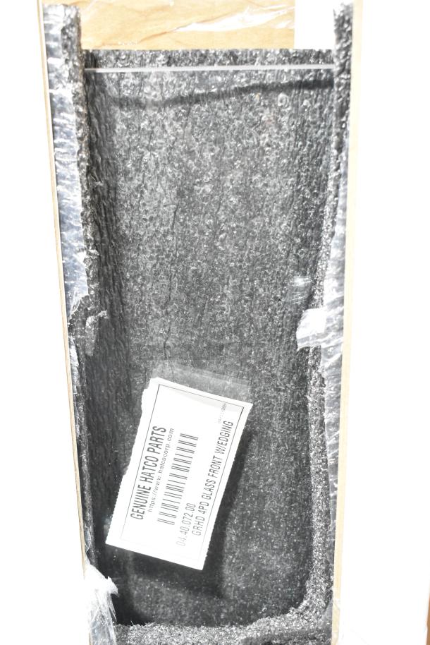 BRAND NEW SCRATCH AND DENT! Hatco GRHD 4PD glass front with edging packaging. Marked "GENUINE HATCO PARTS."