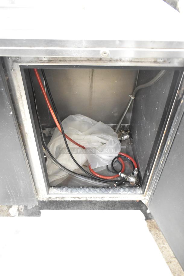 Perlick DS60BLT stainless steel kegerator interior view, showing beer lines and connections. Commercial-grade, 115V, 1 phase.