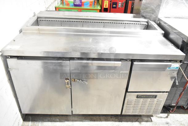 Continental CPA60 stainless steel commercial prep table on casters, 115V, 1 phase, moderate wear, storage compartments visible.