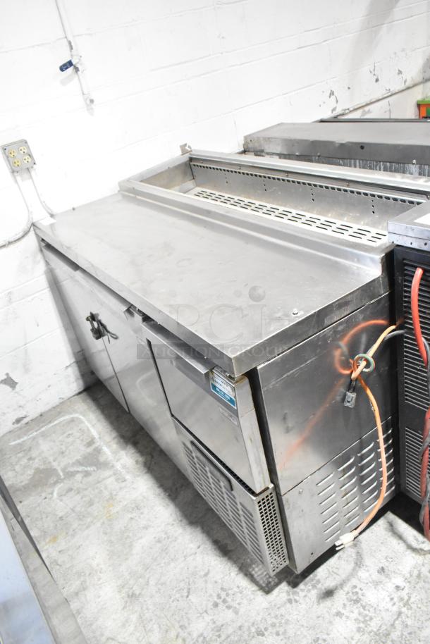 Continental CPA60 stainless steel commercial prep table on casters, 115V, 1 Phase, in used condition, featuring dual doors.