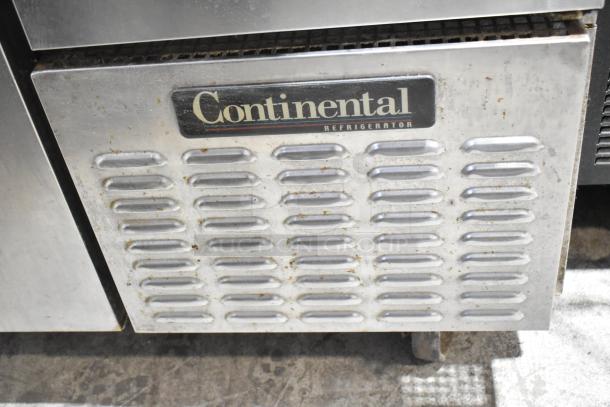 Continental CPA60 stainless steel prep table on casters, 115 volts, 1 phase, commercial-grade, visible wear.