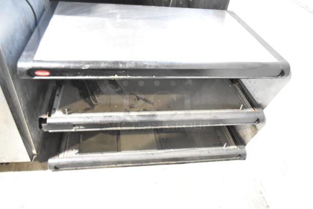 Hatco GR2SDH-36D metal commercial merchandiser, dual horizontal shelves, black trim, electric, used condition.
