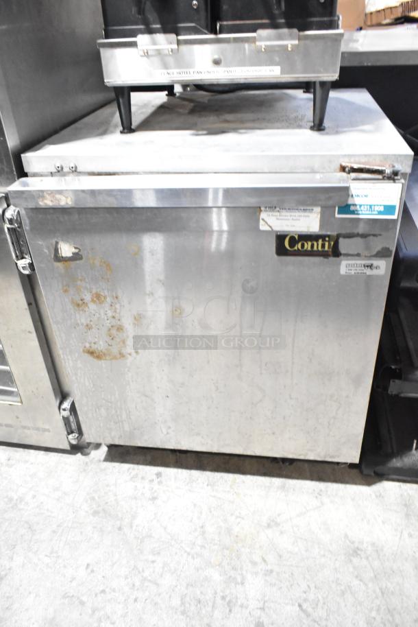 Continental UR27 stainless steel commercial cooler, single door, on casters, 115V, 1 phase, with visible wear and labels.