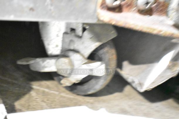 Continental UR27 undercounter cooler commercial caster, showing wheel design. 115V, 1 Phase. Appears in used condition.