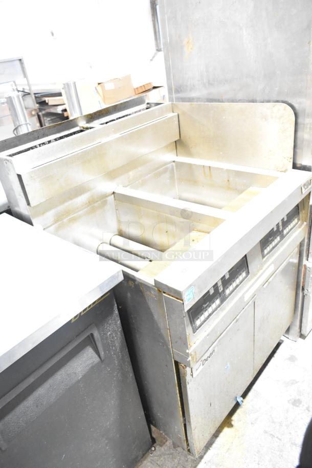 Dean SCFHD250GNC stainless steel commercial gas fryer, 2-bay, 100,000 BTU. Used condition with visible wear.