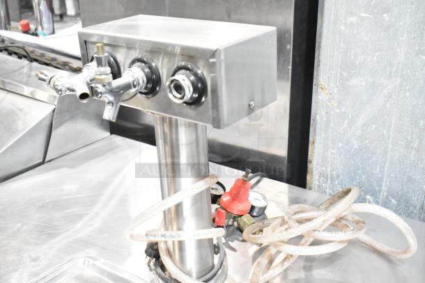 True TDB-24-48 metal kegerator with beer tower, 115 volts, 1 phase. Features dual-tap and regulator. Used condition.