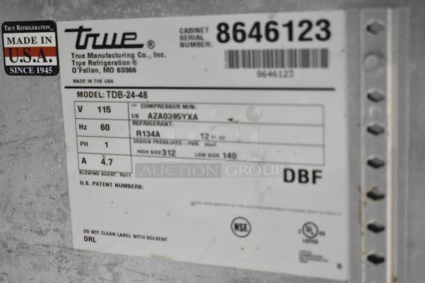 True TDB-24-48 Kegerator label, 115 volts, 1 phase, USA-made. Model details and serial number visible.