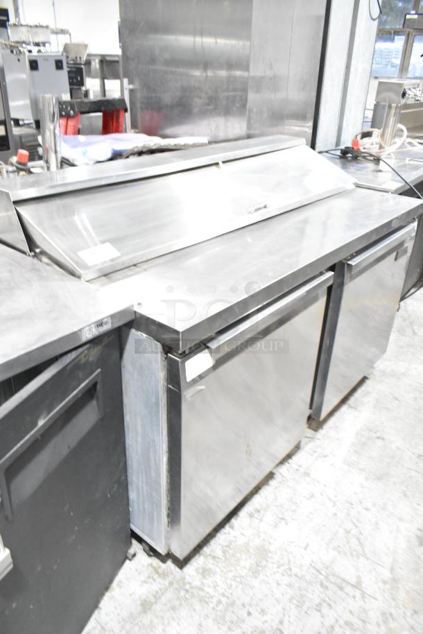 Continental BW60-16 stainless steel sandwich salad prep table with mega top, on casters, 115V, commercial use.