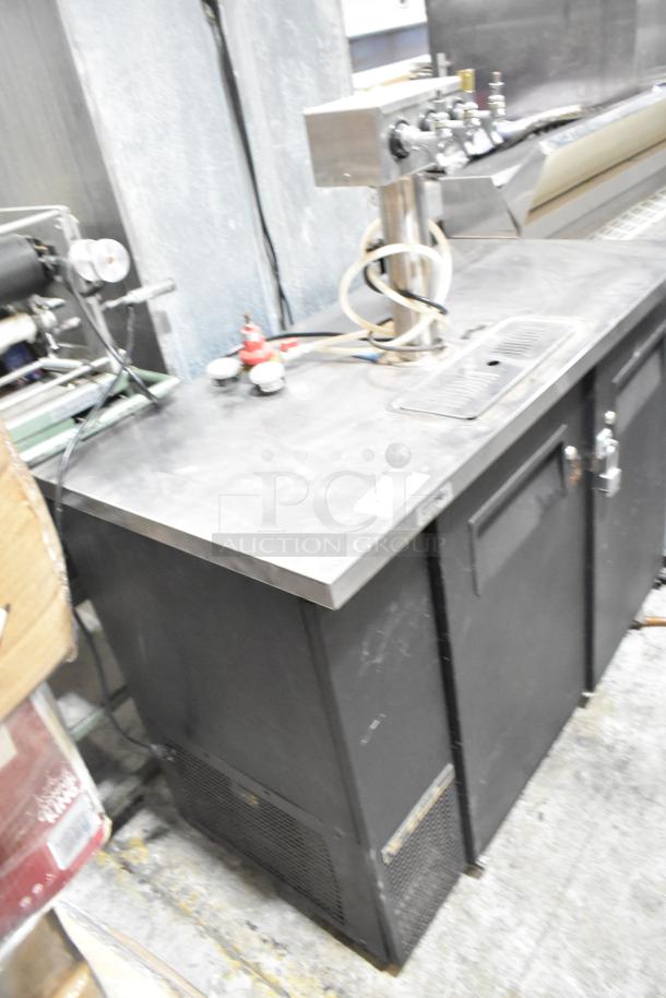 True TDB-24-48 metal commercial kegerator, 3-tap beer tower, 115V, 1 phase. Used condition. Black exterior, silver top.