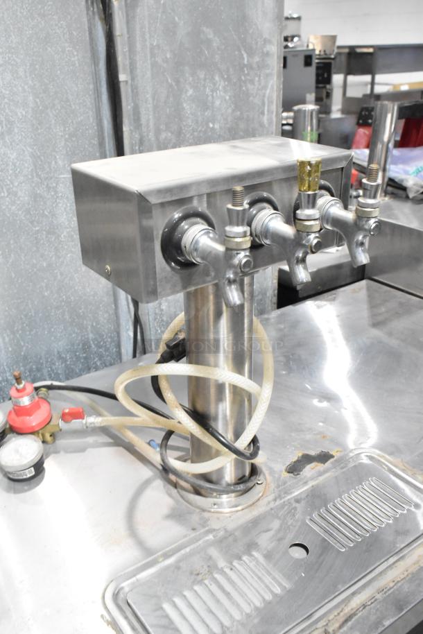 True TDB-24-48 metal kegerator with 3 tap beer tower, visible hoses and fittings, in used condition. 115V, 1 phase.