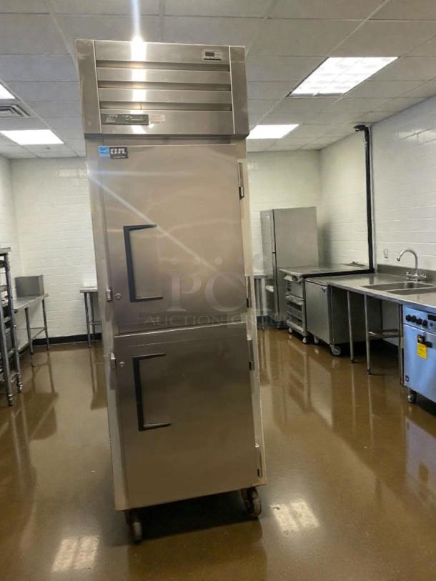 True STMTR-23 commercial reach-in refrigerator, stainless steel, top-tier condition, 115V, single phase, fully tested, True Manufacturing label visible.