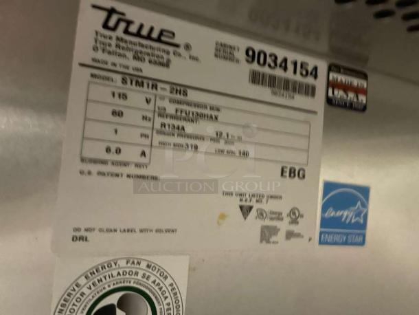 True Manufacturing STMTR-23 refrigerator label showing model, 115V, single phase, Energy Star, made in USA.
