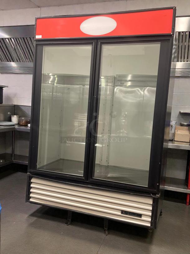 True GDM-49 commercial glass door merchandiser, premium condition; 115V, single phase, fully tested, by True Manufacturing Co.