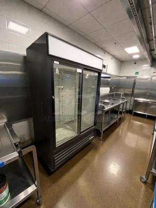 True GDM-45 glass door merchandiser refrigerator in immaculate condition. Fully tested, 115V, single phase.