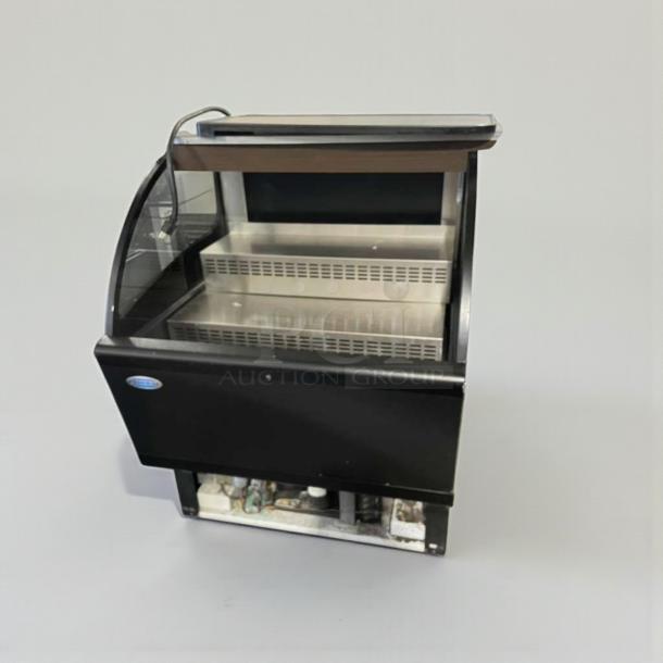 Refrigerated display merchandiser by C. Schmidt, model EHD-4. Excellent condition, 115V, single phase, fully tested.