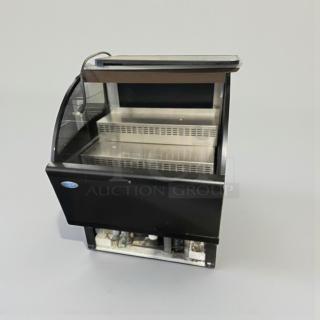 Refrigerated display merchandiser by C. Schmidt, model EHD-4. Excellent condition, 115V, single phase, fully tested.