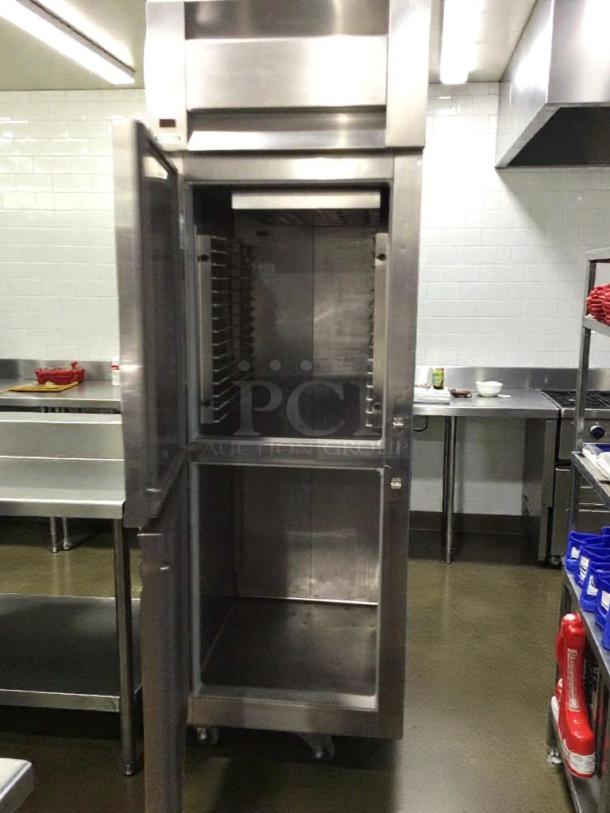 McCall T-102001 commercial reach-in refrigerator/freezer in stainless steel. Tested, working, single phase, 115V, dual-door.