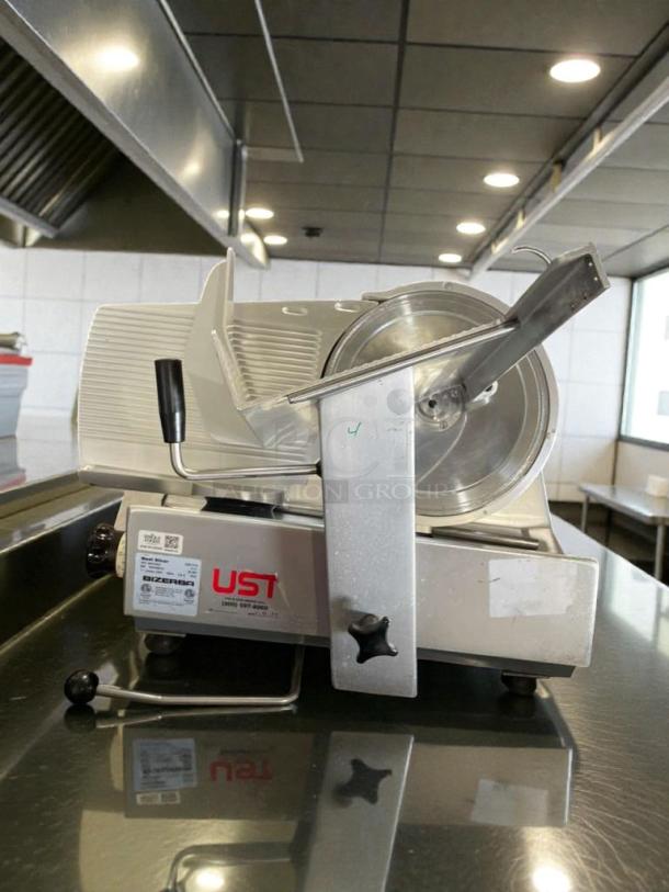 Bizerba GSP H D Commercial Meat Slicer in superior condition, 120V, single phase, fully tested. Model T-11, features visible brand label.