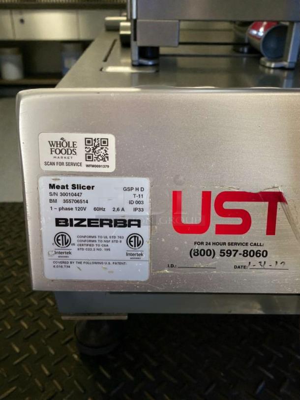 Bizerba GSP H D commercial meat slicer in superior condition, model T-11, 120V, with labels indicating certifications and service info.