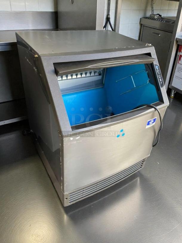 Ice-O-Matic UDF0140A-161B commercial ice maker in excellent condition, 115V/single phase, fully tested, visible controls.