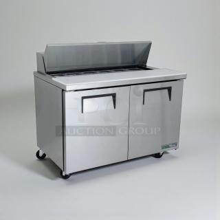 True TSSU-48-12 refrigerated prep table in superior condition, 115V single phase, tested and working, stainless steel finish.