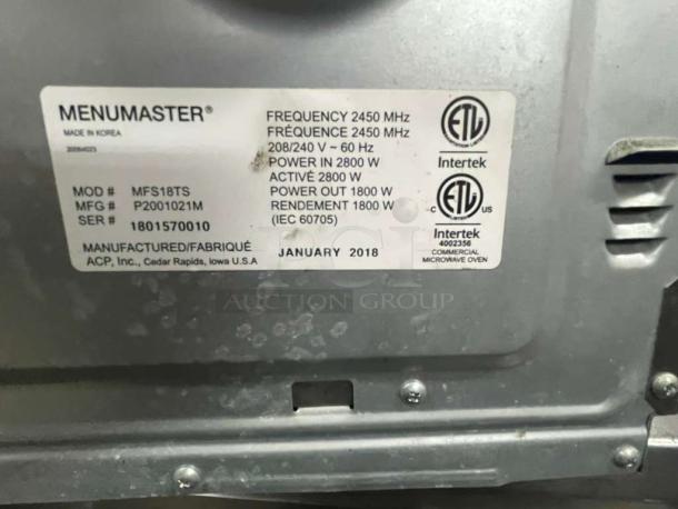 MenuMaster MFS18TS commercial microwave with label showing 208/240V, 1800W power output, manufactured January 2018.