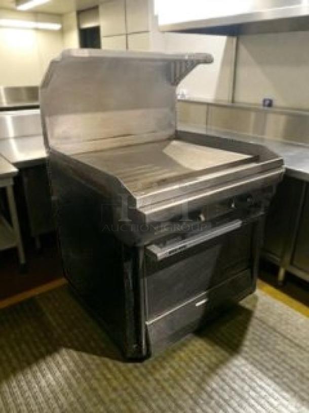 Like-new Commercial Kitchen Equipment gas range with flat griddle and oven. Model GAS-L-RNG-0183, fully tested.
