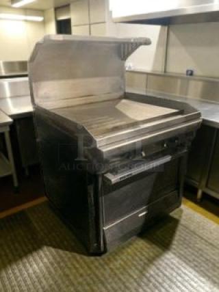 Like-new Commercial Kitchen Equipment gas range with flat griddle and oven. Model GAS-L-RNG-0183, fully tested.
