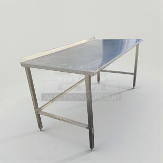 High-grade stainless steel commercial work table, 72", with backsplash. Inspected, excellent condition, model SS-S-TBL-0184.