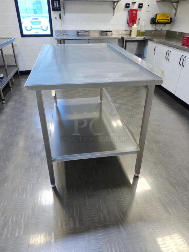 Stainless steel commercial work table with backsplash, 72", high-grade condition, fully inspected, unbranded model SS-S-TBL-0184.