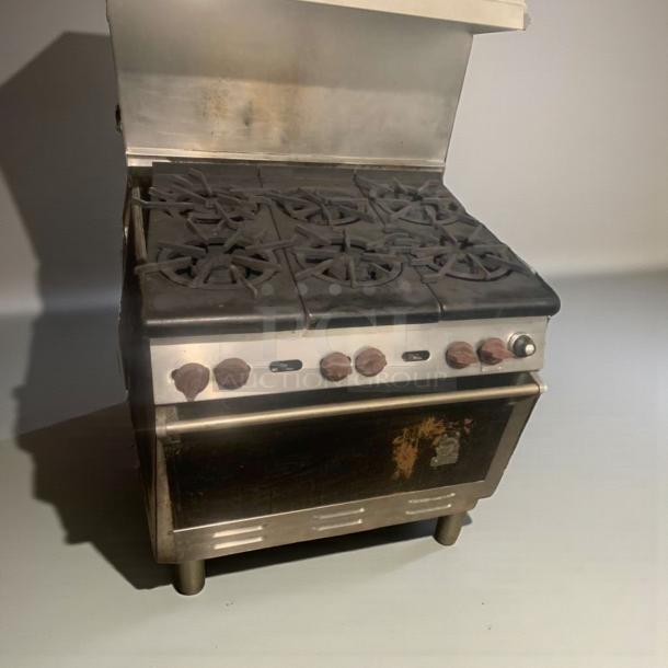 Commercial 6-burner gas range with oven, model COM-L-RNG-187, refined condition, fully tested and working.