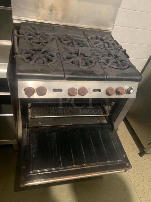 Commercial 6-burner gas range with oven, model COM-L-RNG-187. Used condition, fully tested, functional.