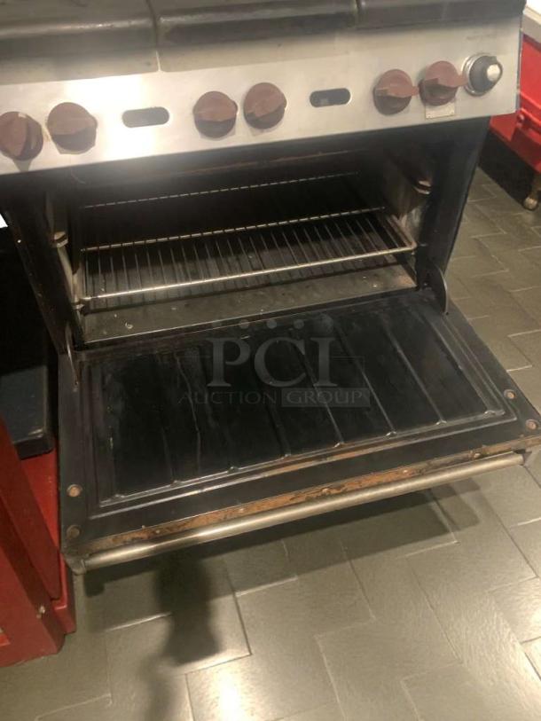 Commercial 6-burner gas range with oven, model COM-L-RNG-187; fully tested, working, refined condition, generic brand.