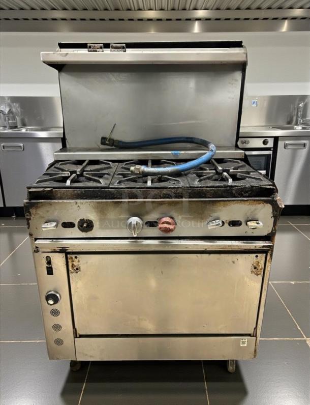 Immaculate JADE 36" Commercial Gas Range with oven, natural gas, model JAD-L-RNG-0193. Fully tested and working.